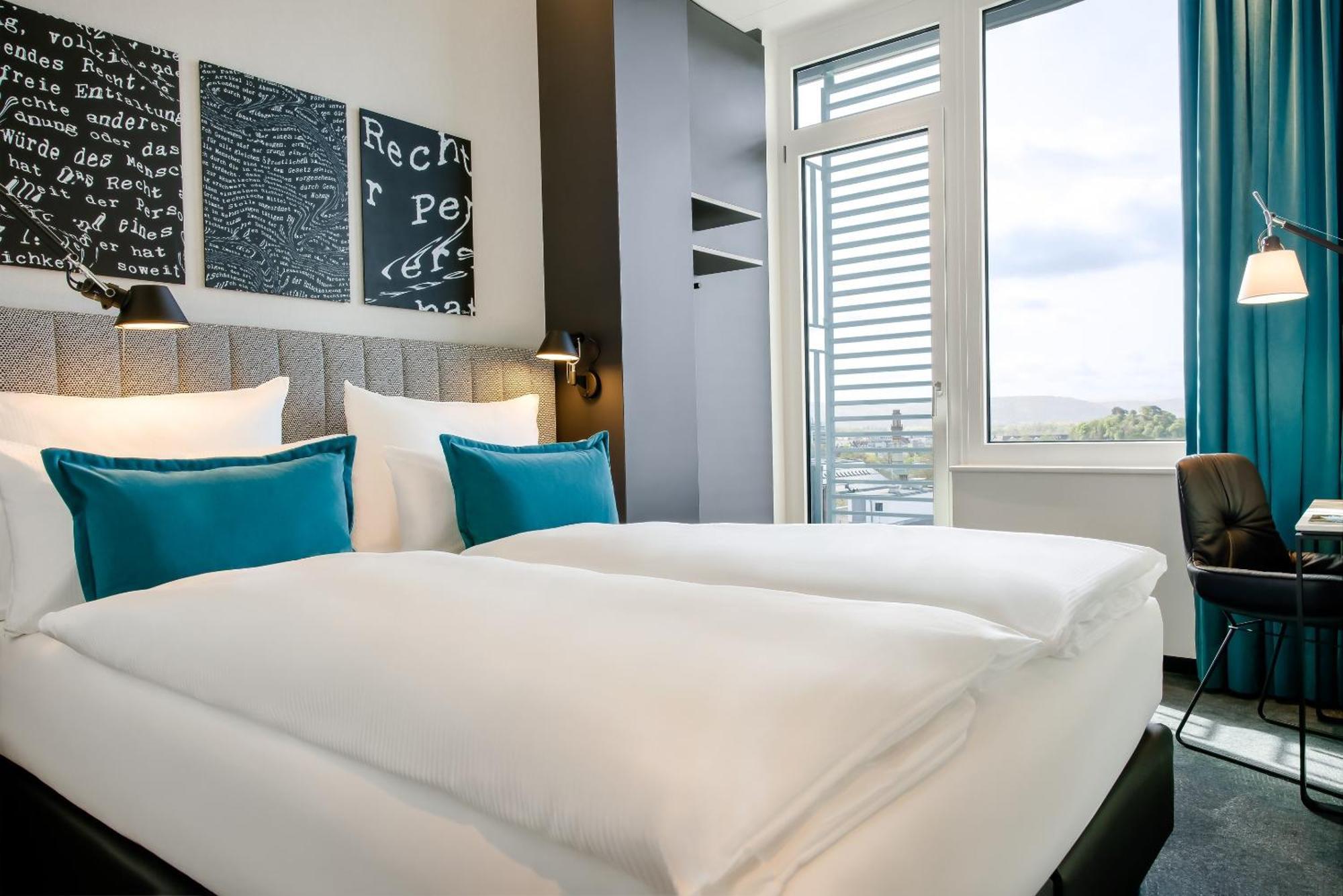 Motel One คาร์ลสรูเฮอ ภายนอก รูปภาพ